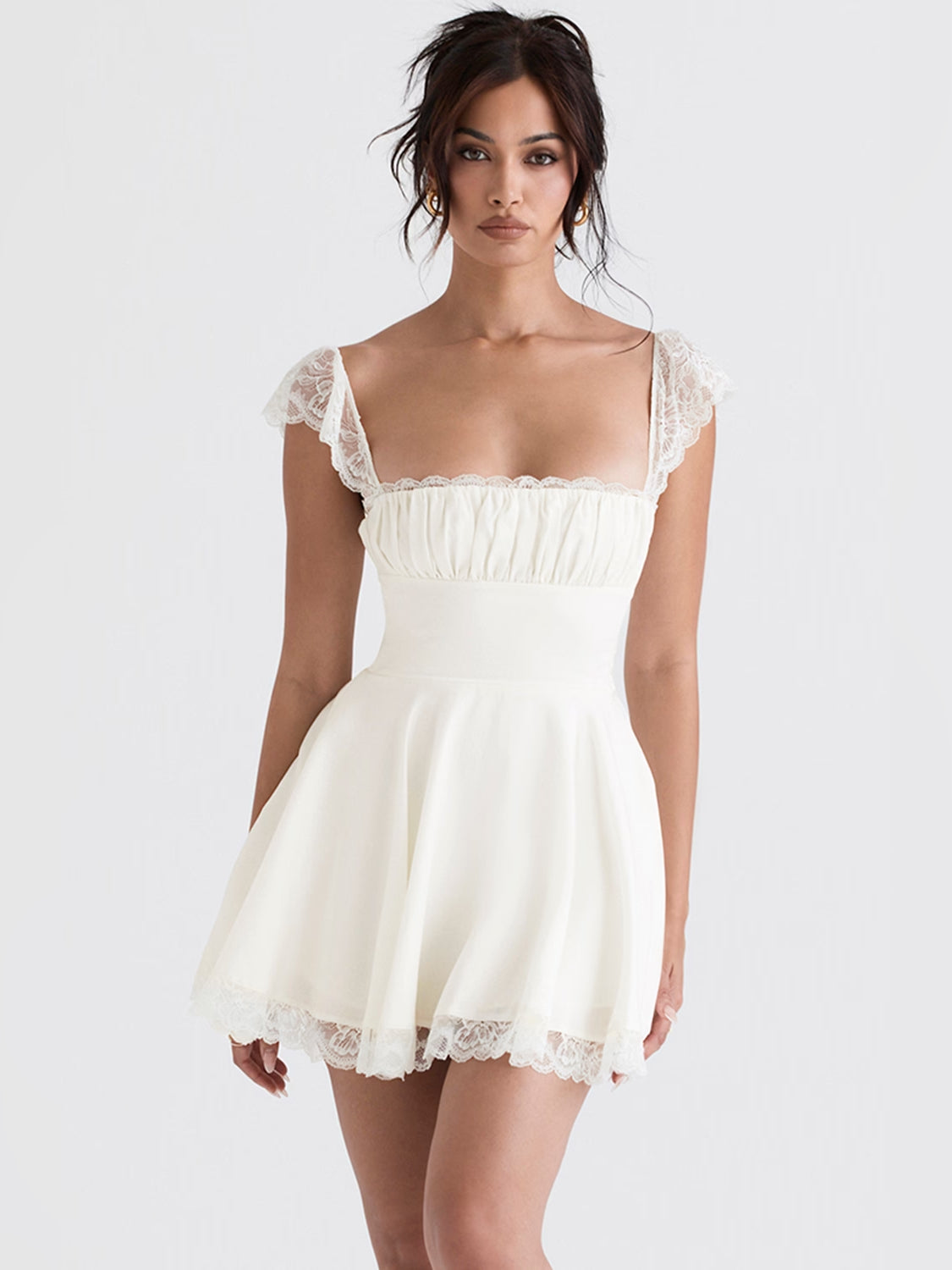 Ivory mini homecoming dress, alternate view showing the dress shape and hem