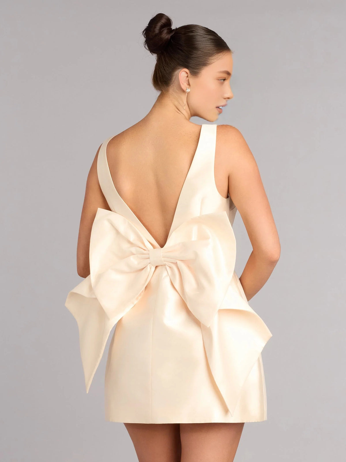 Gold mini homecoming dress, alternate view showing the dress shape and hem