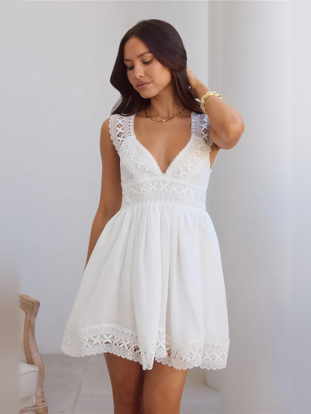 White mini homecoming dress, alternate view showing the dress shape and hem