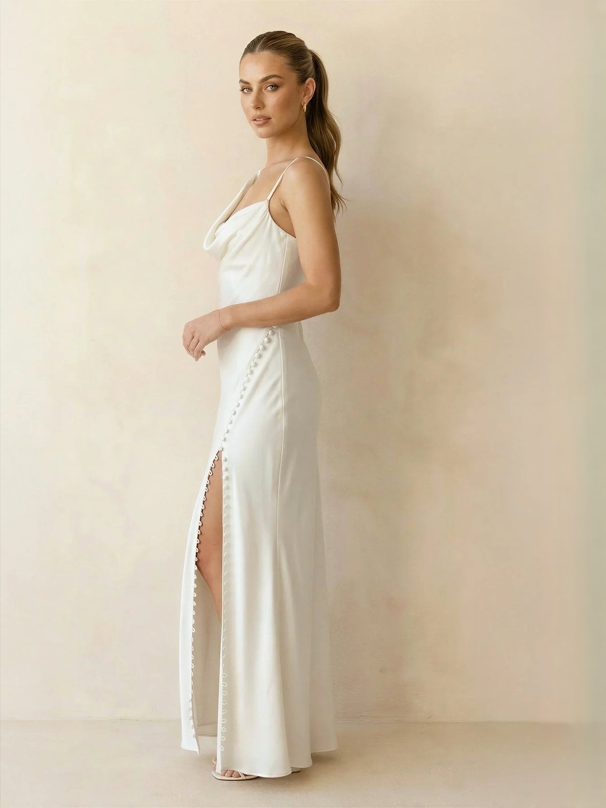 Ivory maxi bridesmaid dress, alternate view showing the dress shape and hem