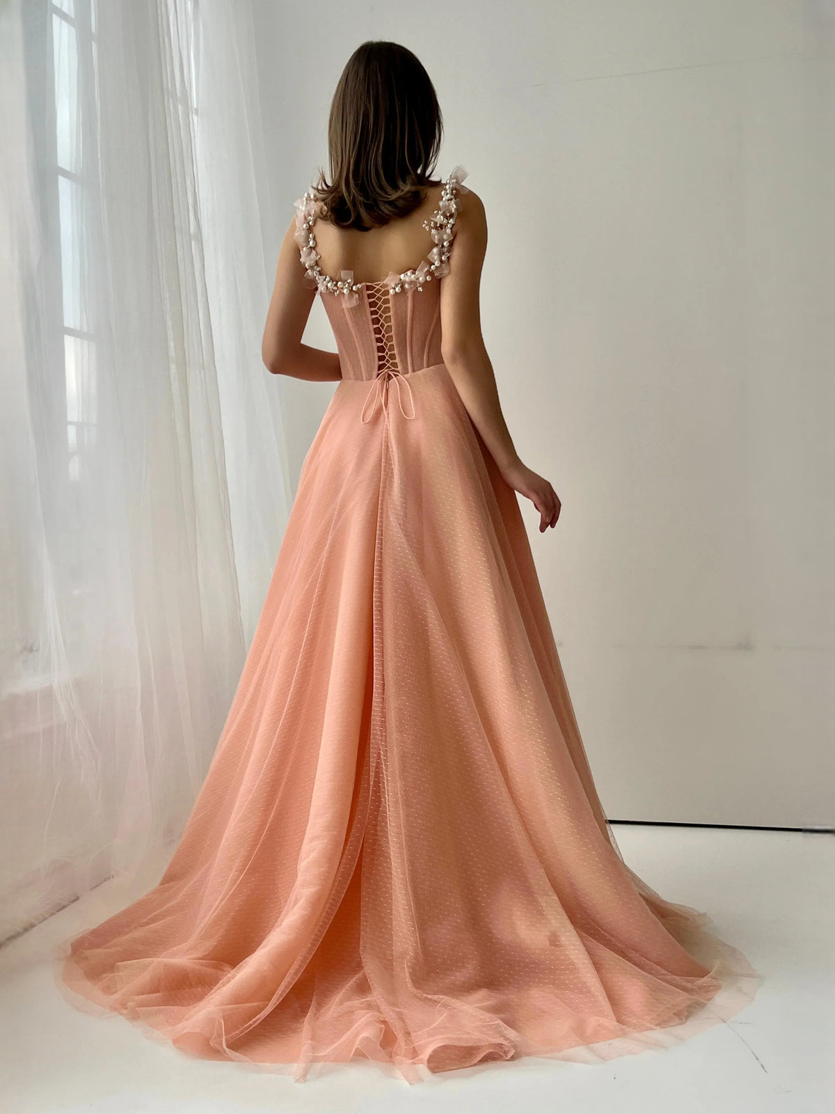 Apricot floor-length prom dress, alternate view showing the dress shape and hem