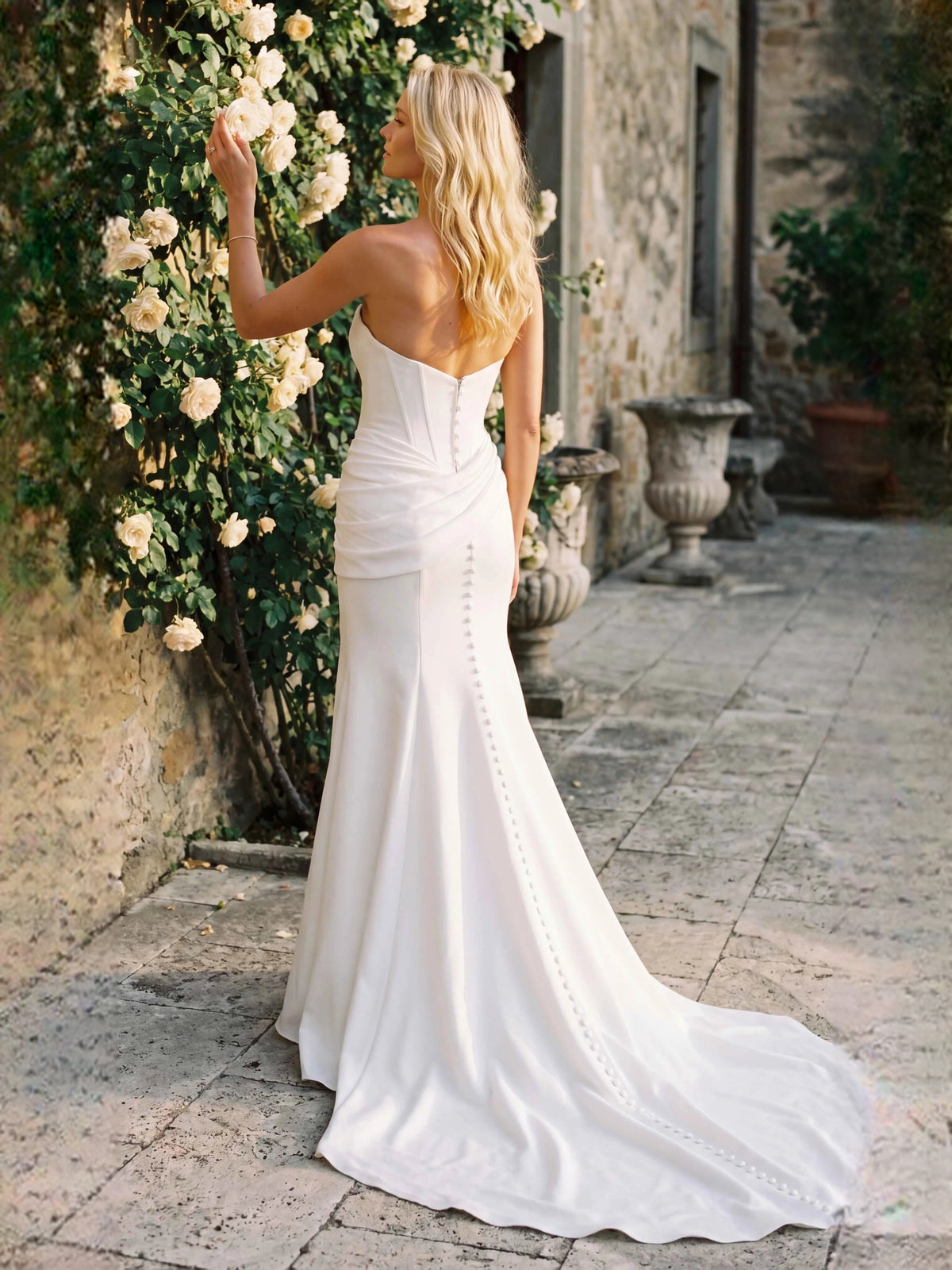 Ivory floor-length wedding dress, alternate view showing the dress shape and hem