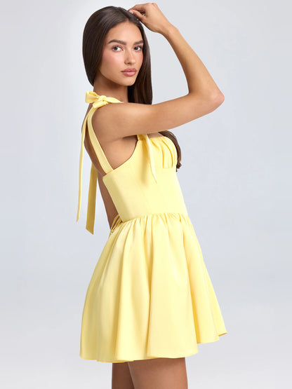 Yellow mini homecoming dress, alternate view showing the dress shape and hem