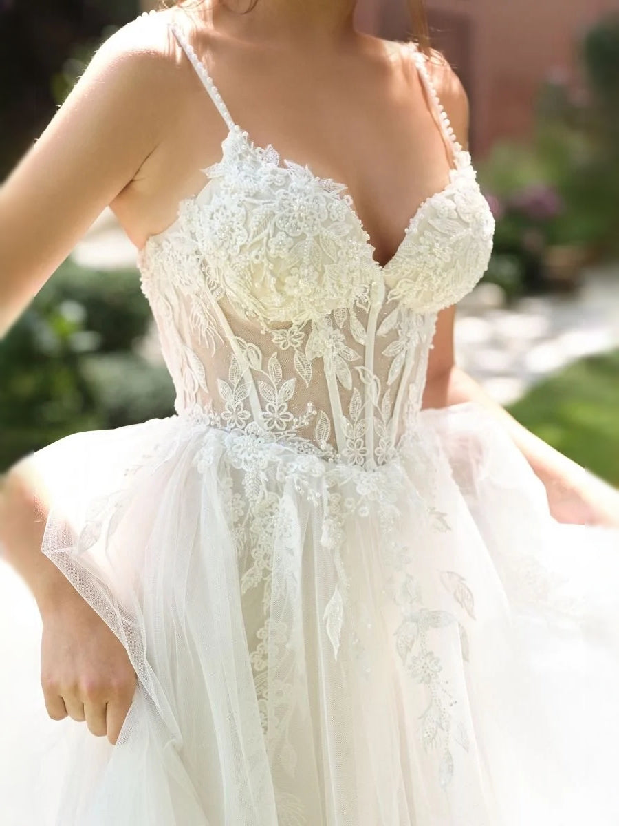 Ivory floor-length wedding dress, alternate view showing the dress shape and hem