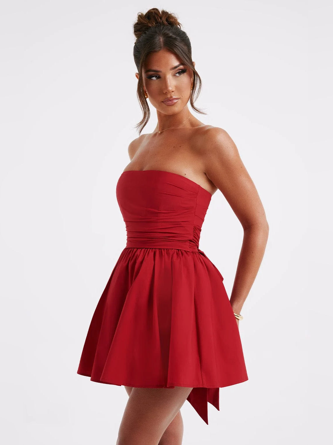 Red mini homecoming dress, alternate view showing the dress shape and hem