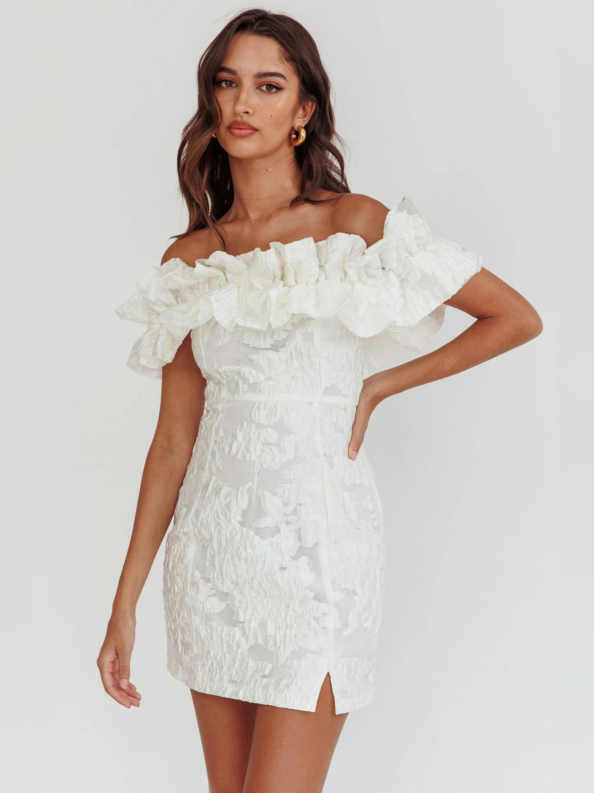 White mini homecoming dress, alternate view showing the dress shape and hem