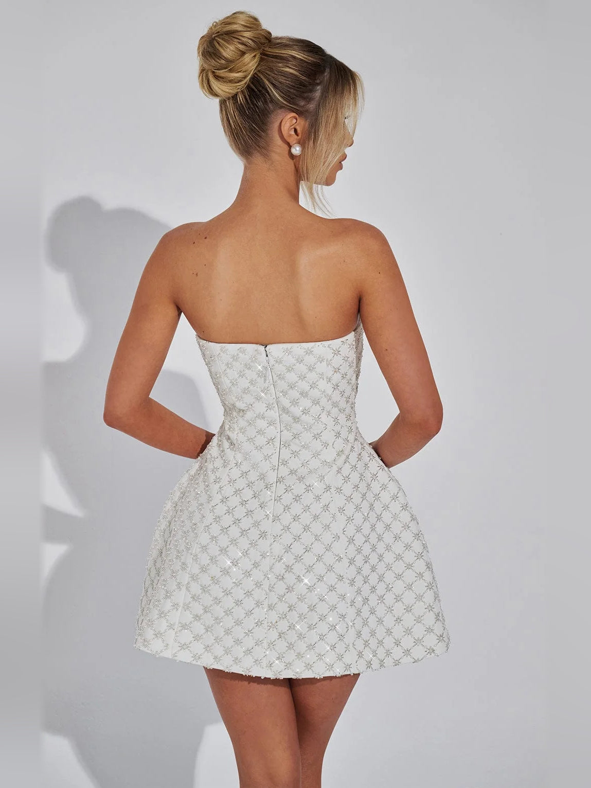 Ivory mini homecoming dress, alternate view showing the dress shape and hem