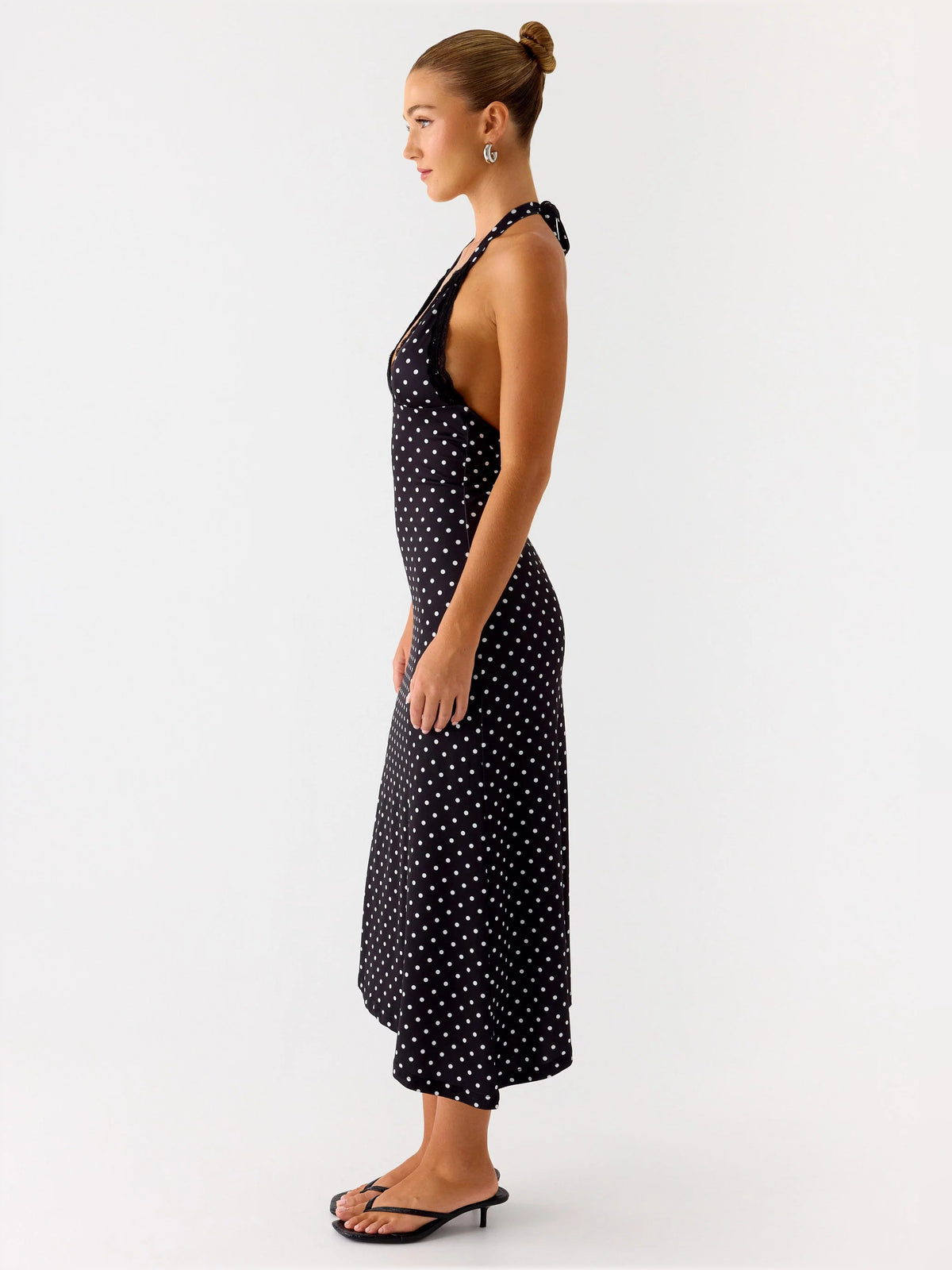 Black midi formal dress with halter neckline, alternate view showing the waist