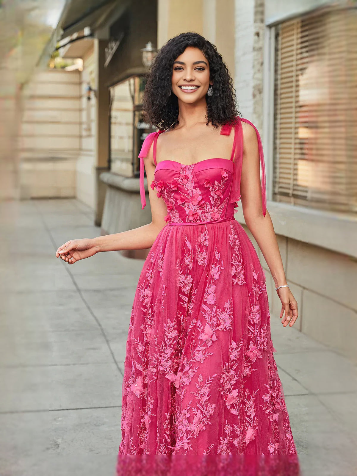 Hot Pink floor-length prom dress, back view showing the rear of the dress in an additional pose