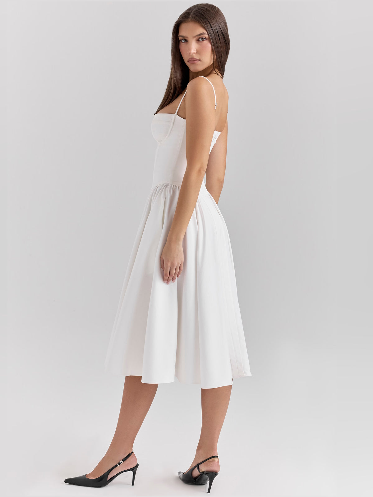 White midi formal dress with corset-style bodice, alternate view showing the waist
