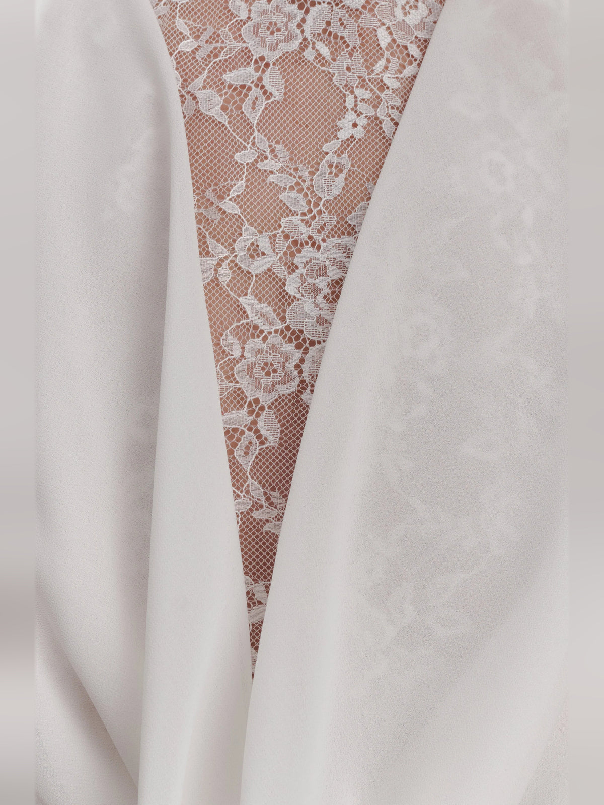 White mini homecoming dress, alternate view showing the overall dress design