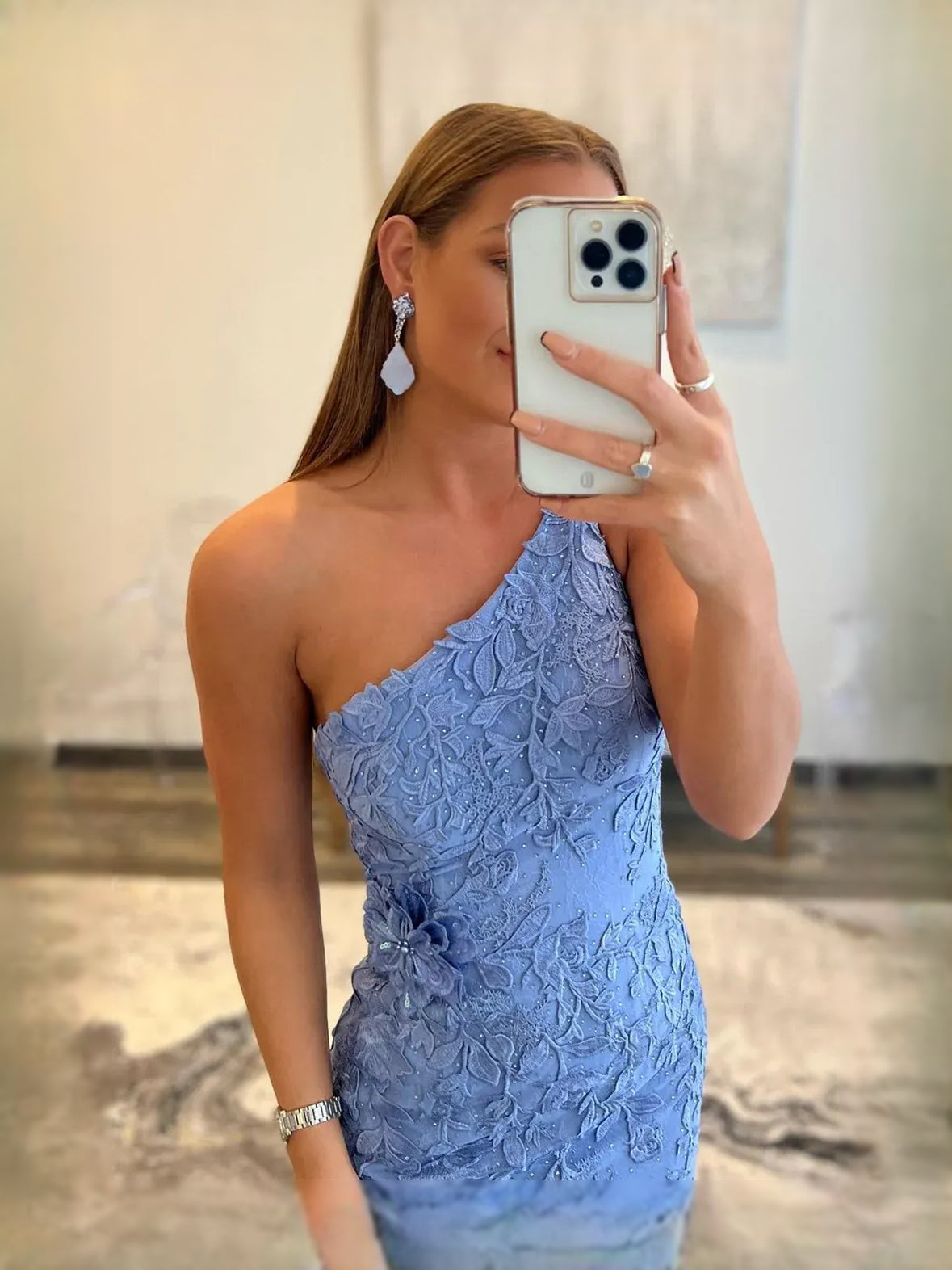 Light Blue maxi prom dress, back view showing the rear of the dress in an additional pose