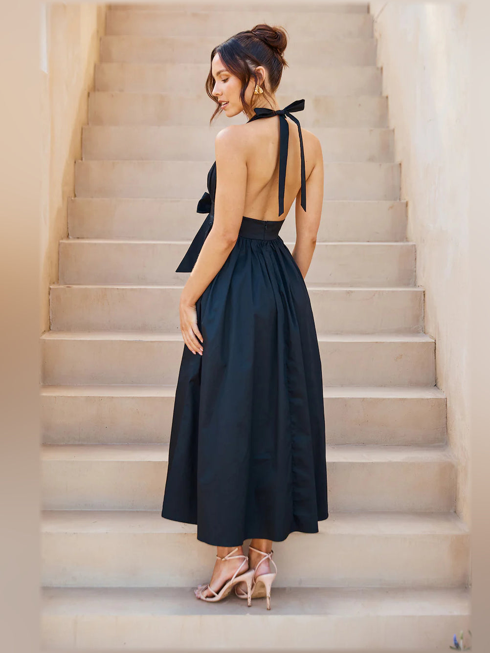 Black midi formal dress with halter neckline, alternate view showing the waist