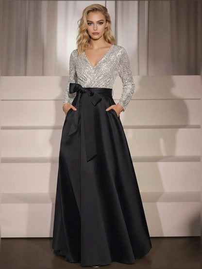 Black a-line floor-length formal dress with floral appliqué, alternate view showing the waist