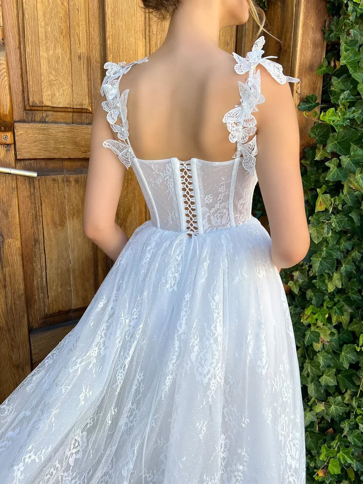 White a-line tea-length formal dress with corset-style bodice, alternate view showing the waist