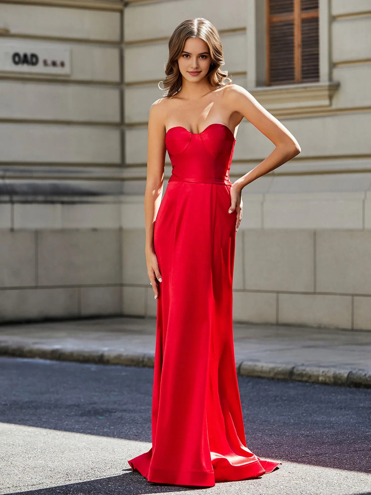 Red sheath floor-length formal dress with corset-style bodice, alternate view showing the waist