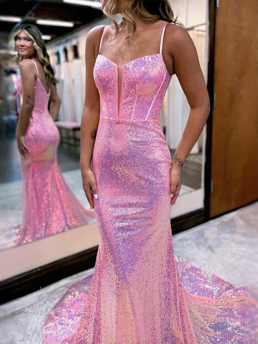 Pink maxi prom dress, back view showing the rear of the dress in an additional pose