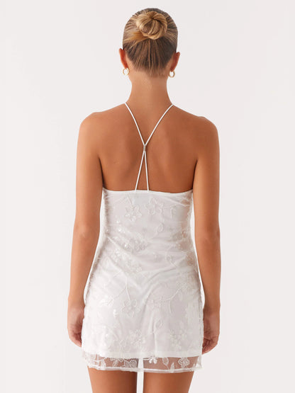 White mini homecoming dress, alternate view showing the overall dress design