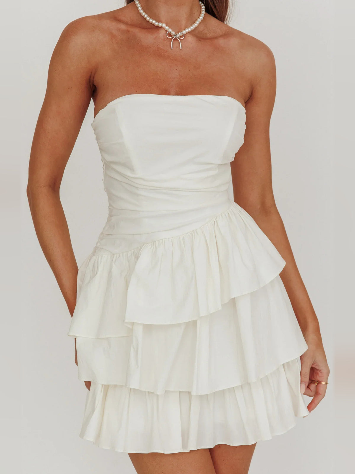 Ivory mini homecoming dress, alternate view showing the overall dress design