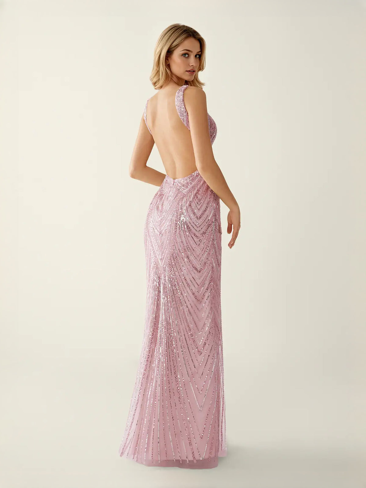Light Pink maxi prom dress, back view showing the rear of the dress from another angle