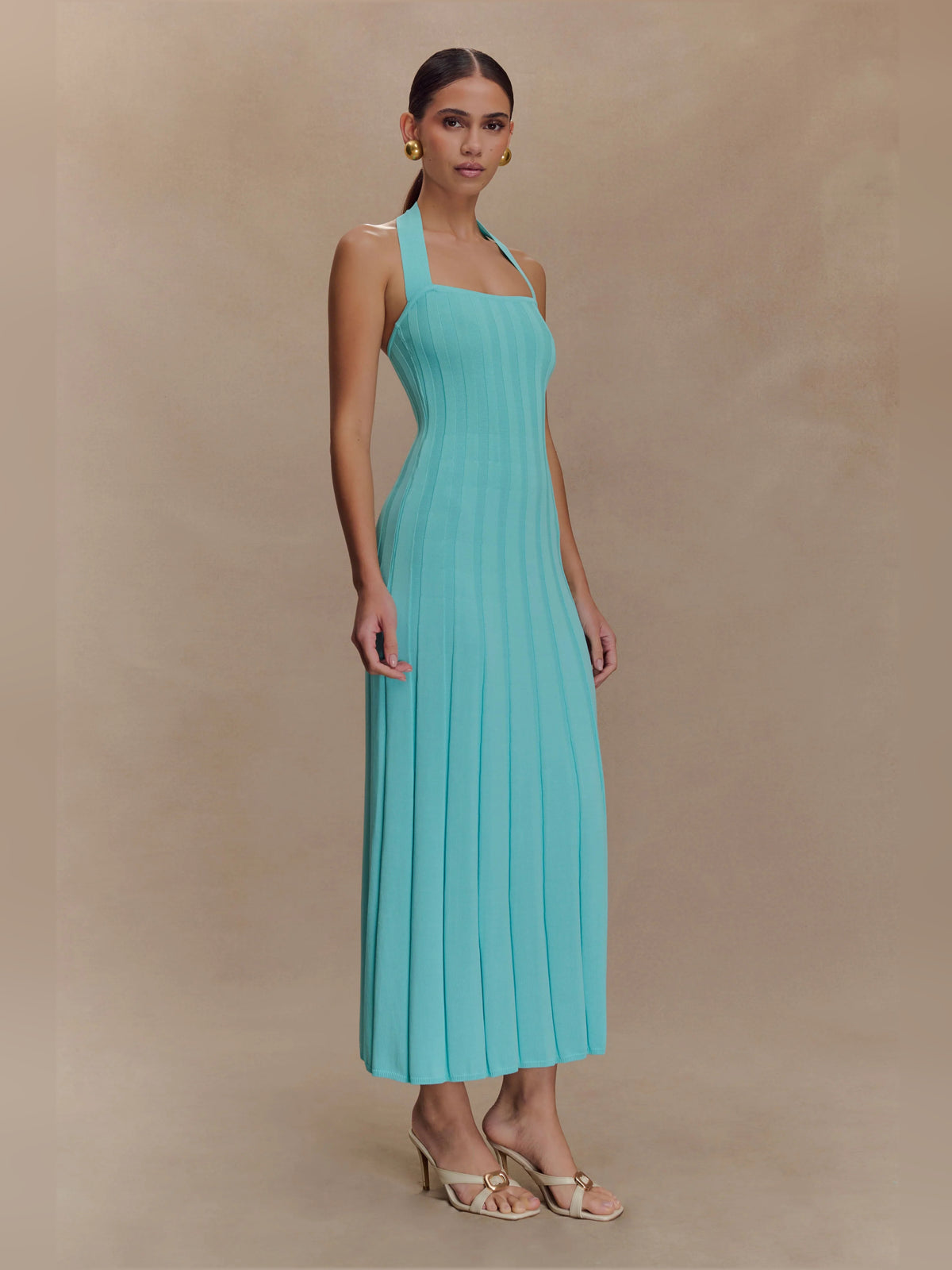Blue midi formal dress with halter neckline, alternate view showing the waist
