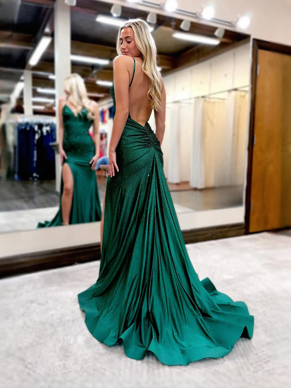 Royal Blue floor-length prom dress, back view showing the rear of the dress in an additional pose