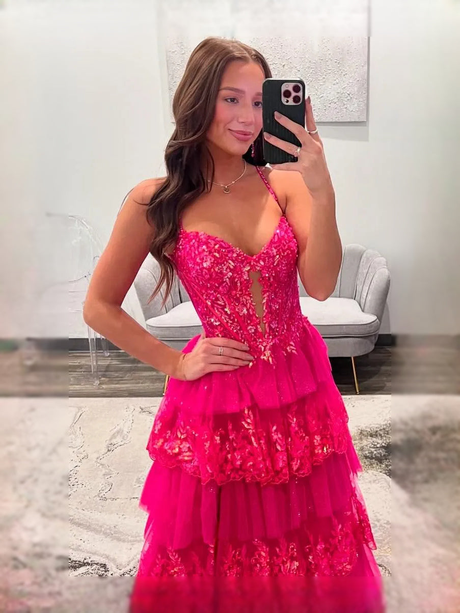 Hot Pink maxi prom dress, back view showing the rear of the dress from another angle