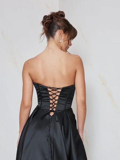 Black a-line floor-length formal dress with corset-style bodice, alternate view showing the waist
