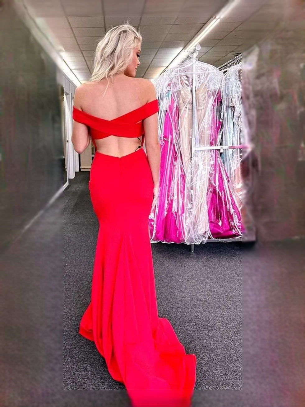 Red maxi prom dress, back view showing the rear of the dress in an additional pose