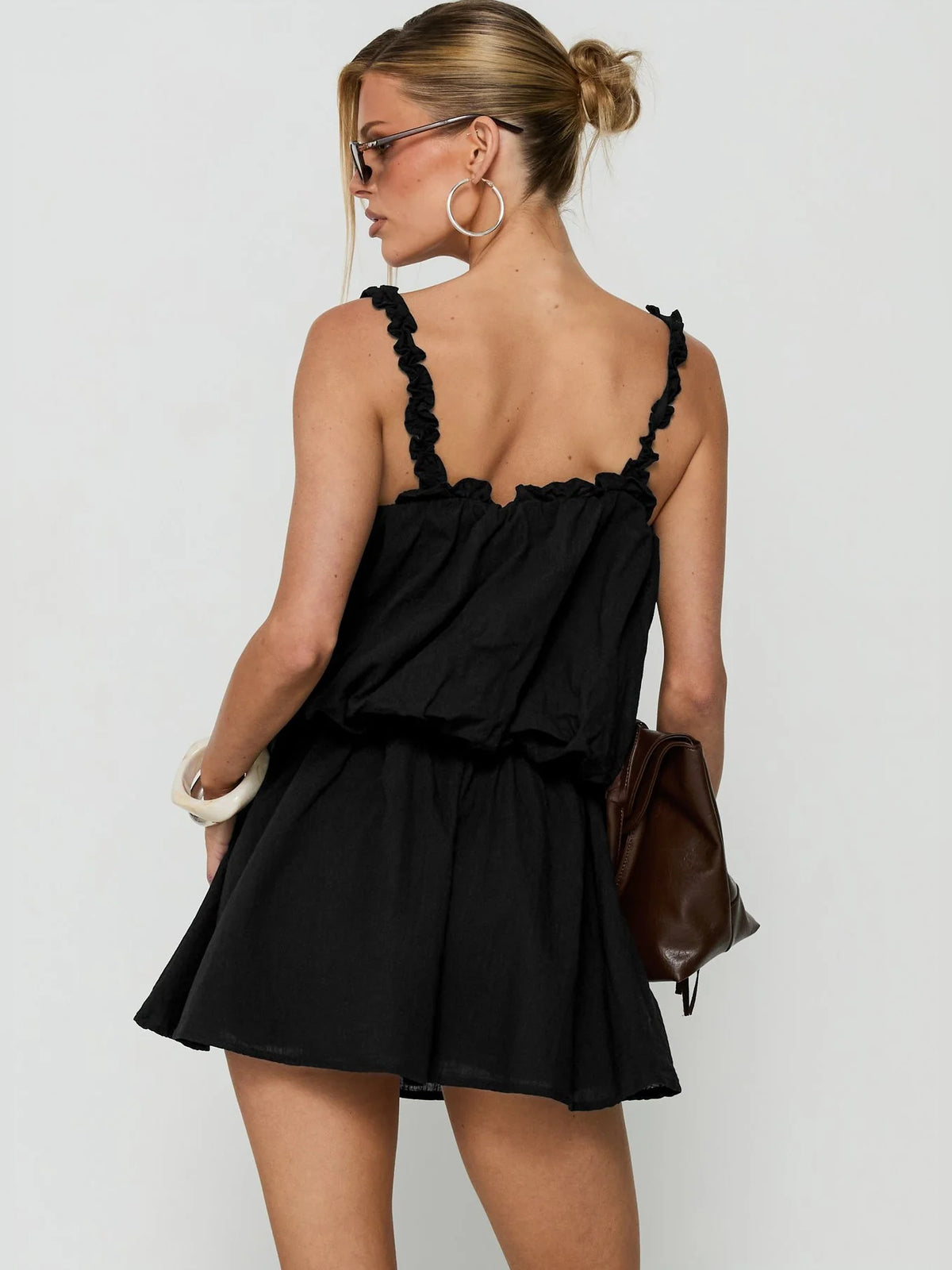 Black mini homecoming dress, alternate view showing the overall dress design