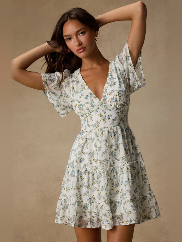 White Floral mini homecoming dress, alternate view showing the overall dress design