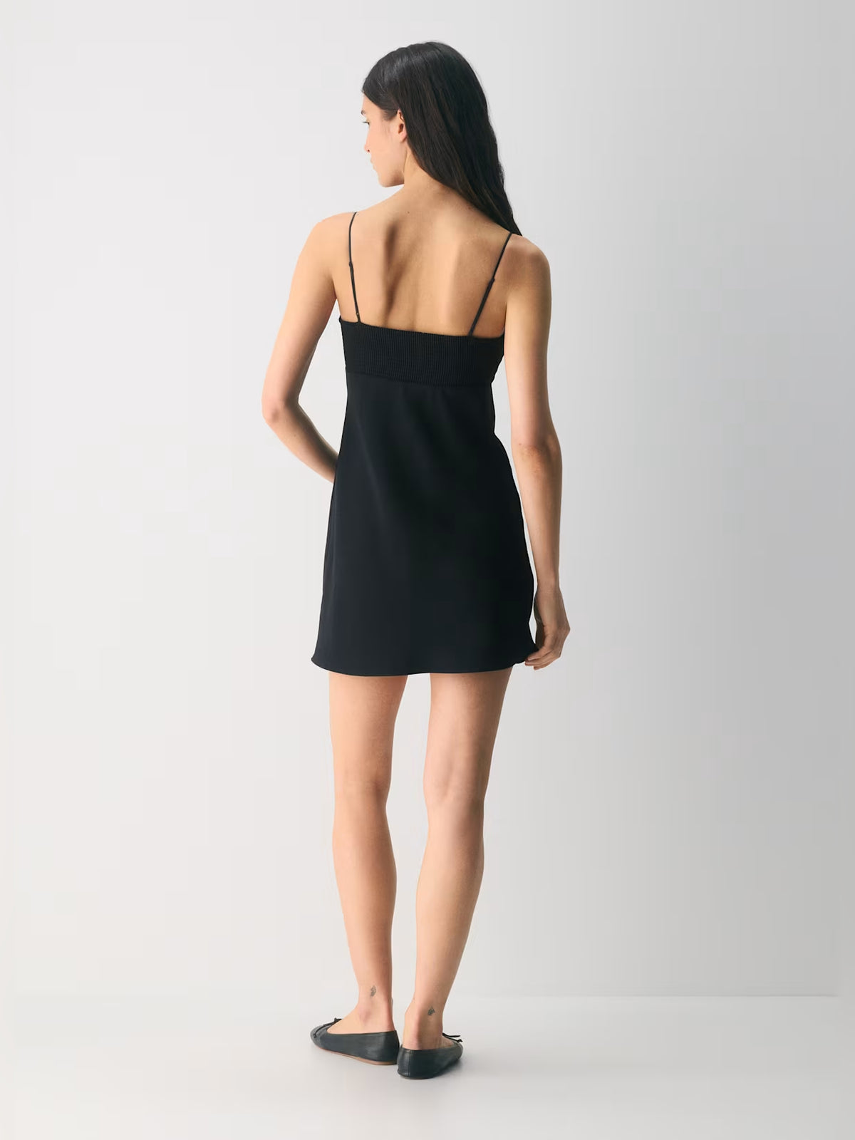 Black mini homecoming dress, alternate view showing the overall dress design