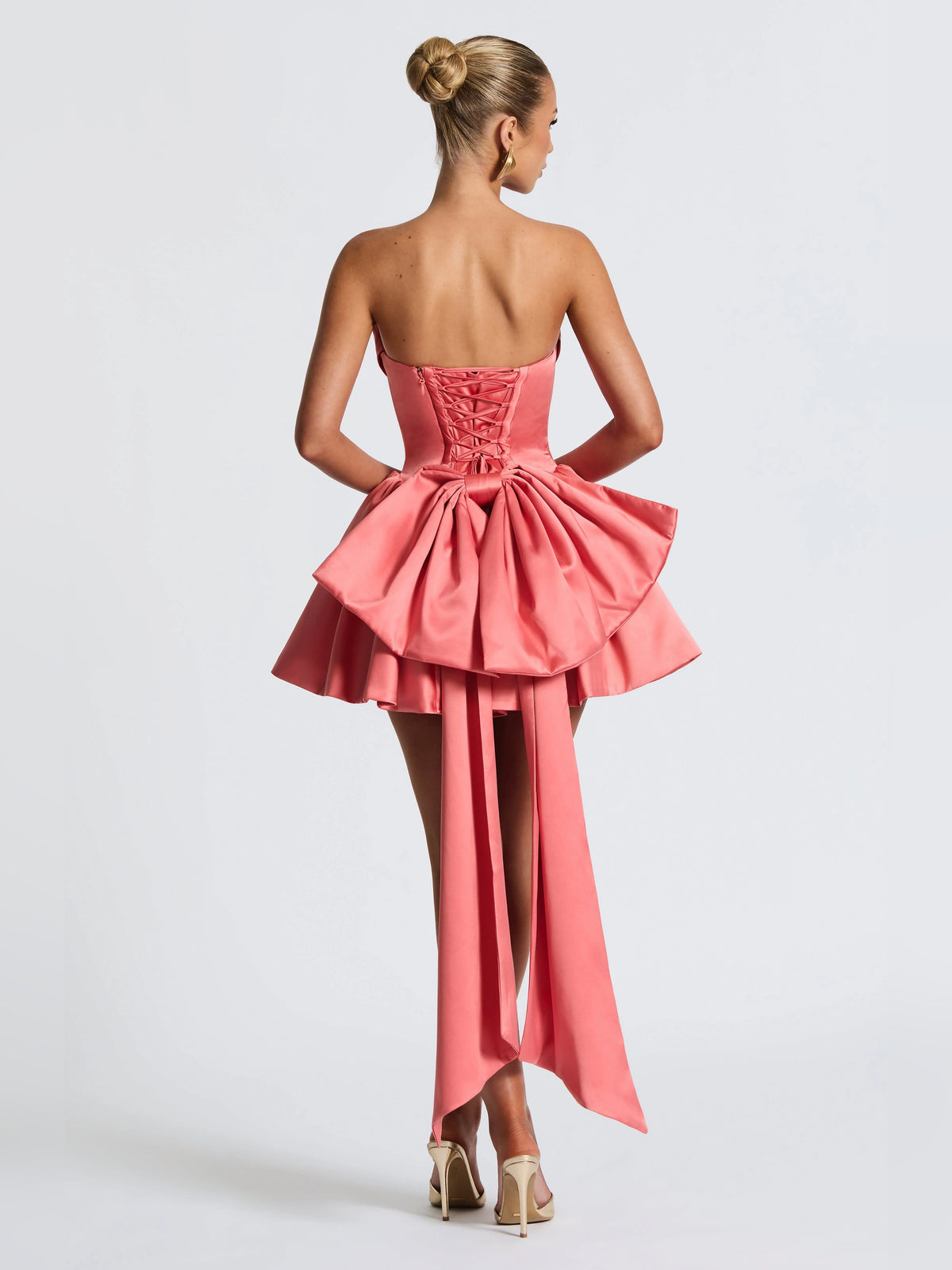 Pink mini homecoming dress, alternate view showing the skirt and hem