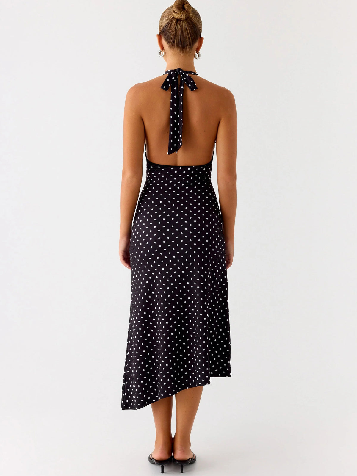 Black midi formal dress with halter neckline, alternate view showing the skirt