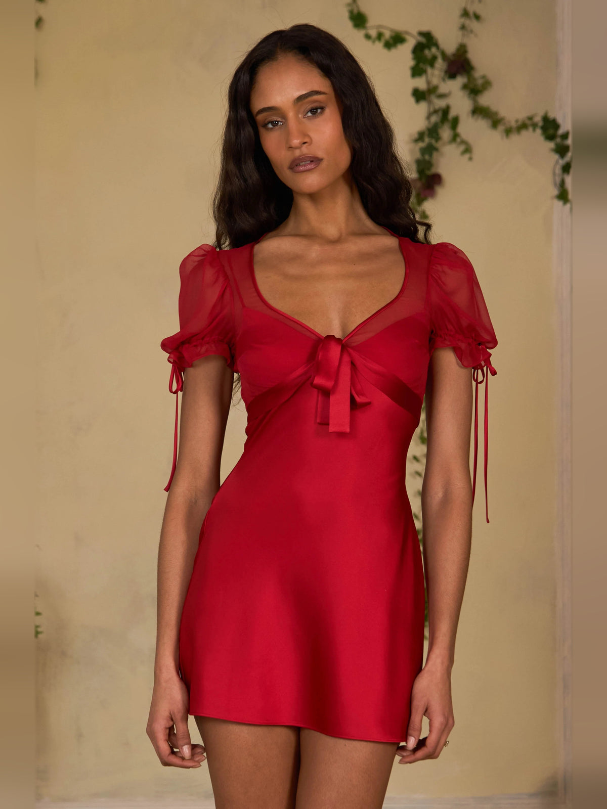 Red mini homecoming dress, alternate view showing the skirt and hem
