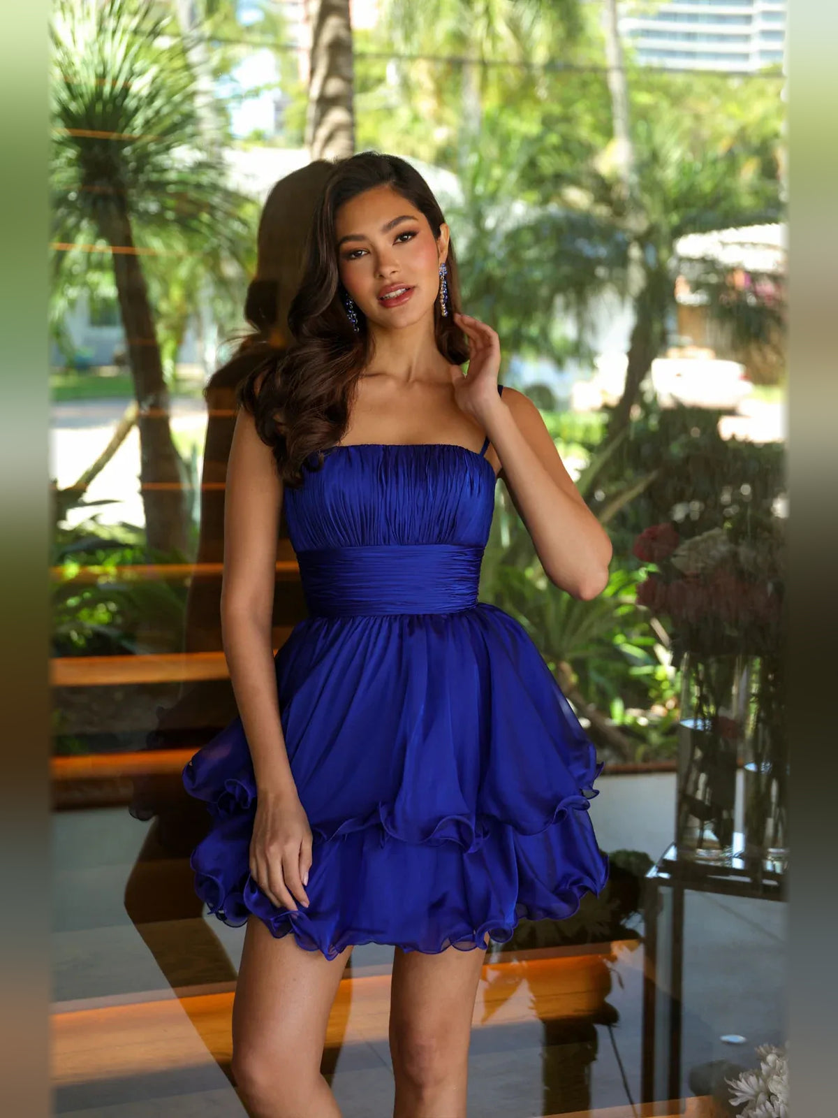 Turquoise mini homecoming dress, alternate view showing the skirt and hem