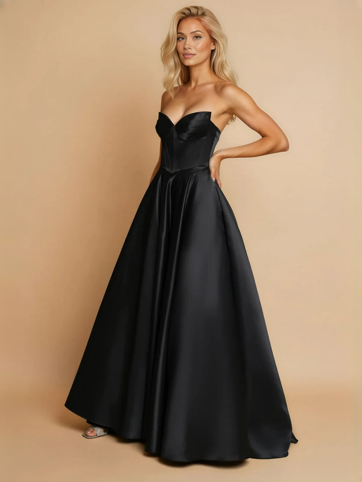 Black maxi prom dress, alternate view showing the skirt and hem