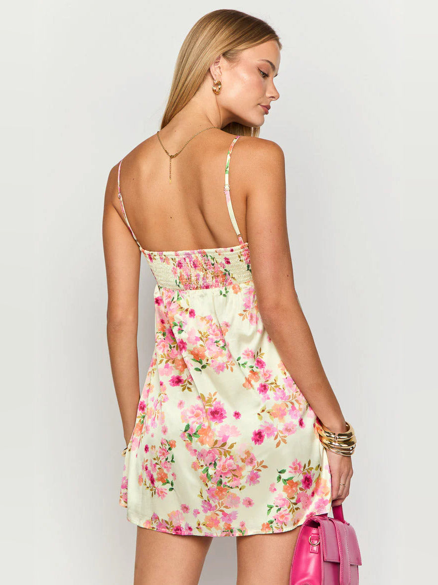 Yellow mini homecoming dress, alternate view showing the skirt and hem