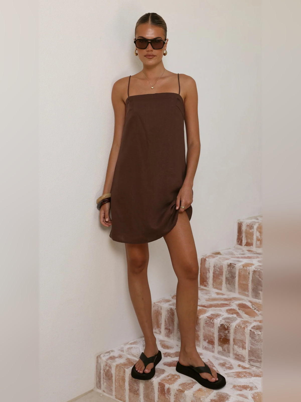 Brown mini homecoming dress, alternate view showing the skirt and hem