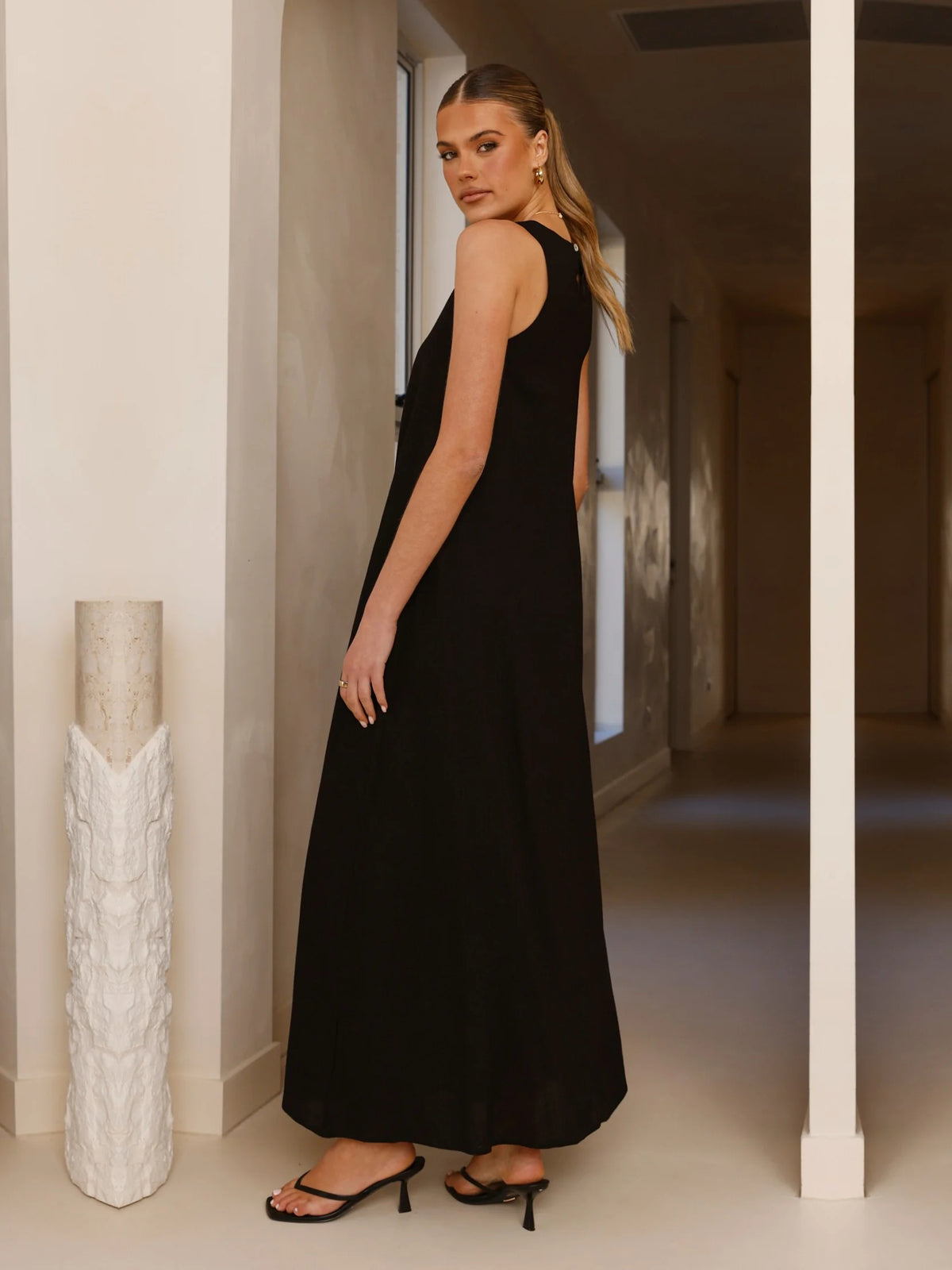 Black a-line maxi formal dress with a-line, alternate view showing the skirt