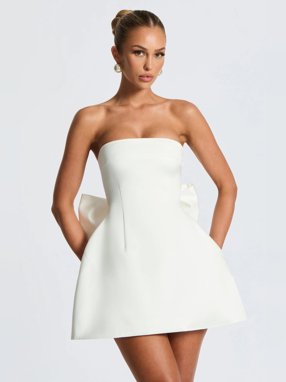Ivory mini homecoming dress, alternate view showing the skirt and hem