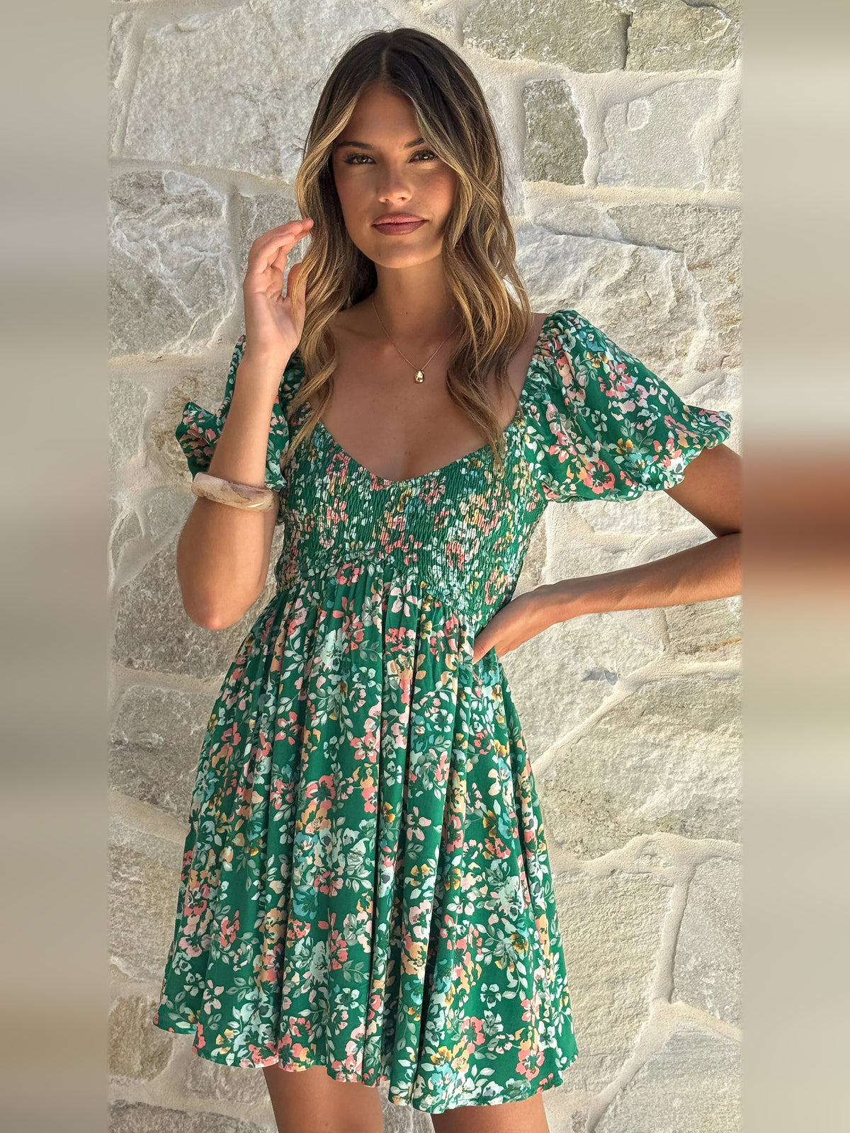 Green Floral mini homecoming dress, alternate view showing the skirt and hem