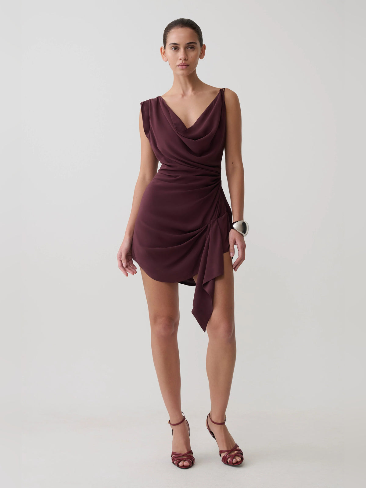 Plum mini homecoming dress, alternate view showing the skirt and hem