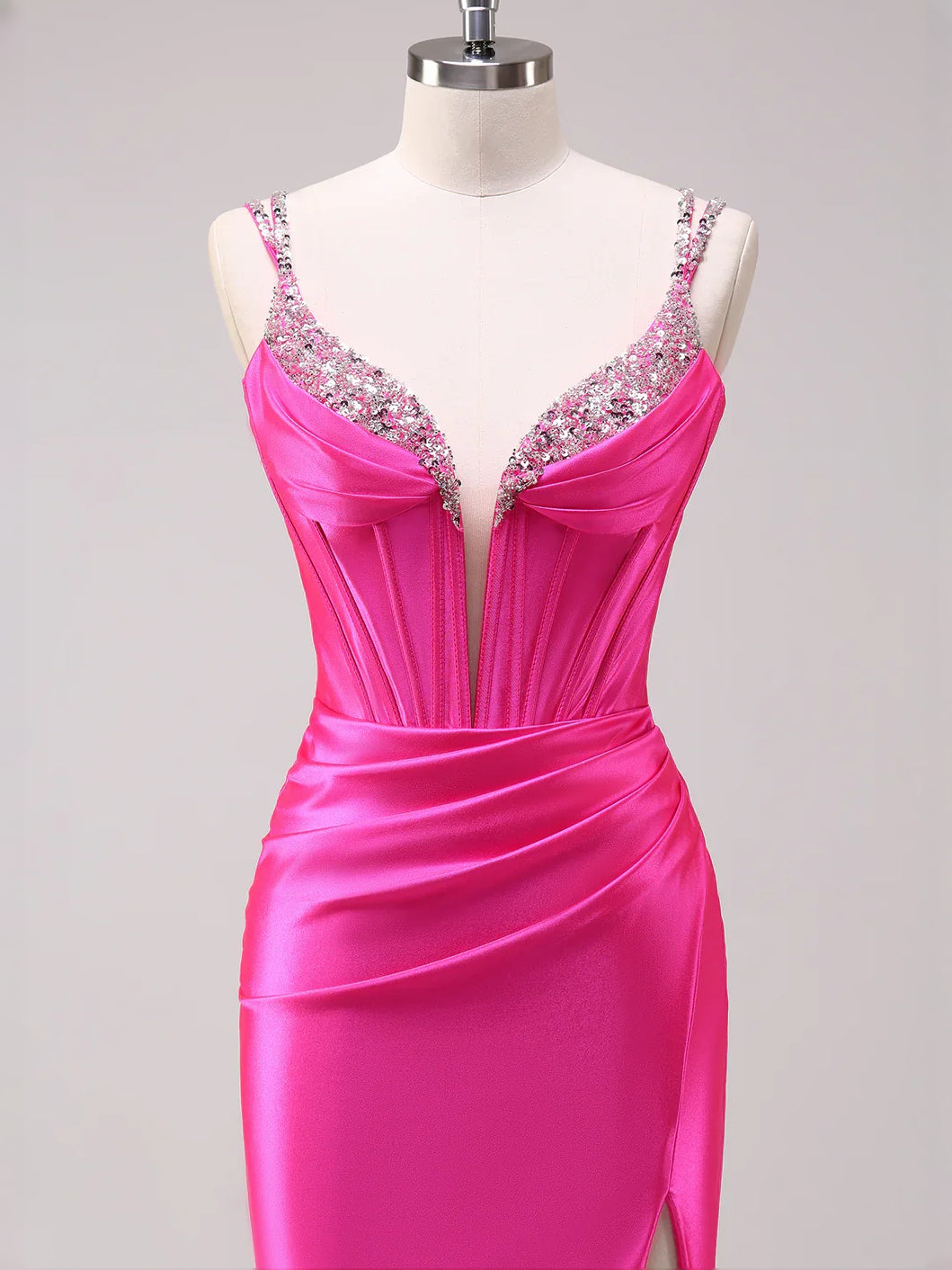 Hot Pink floor-length prom dress, back view showing the rear of the dress with the dress shown closer