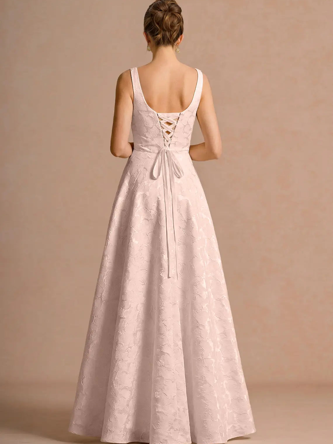 Ivory maxi mother of the bride dress, alternate view showing the skirt and hem