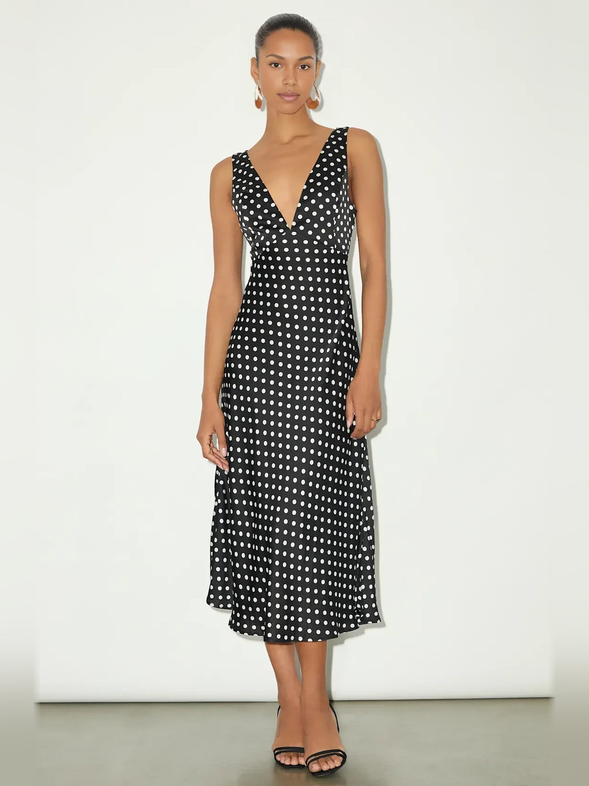 Neon Green midi homecoming dress, alternate view showing the skirt and hem