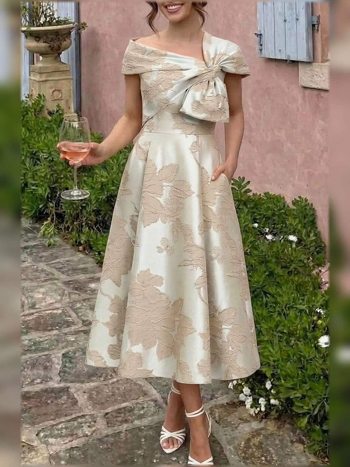 Champagne tea-length mother of the bride dress, alternate view showing the skirt and hem
