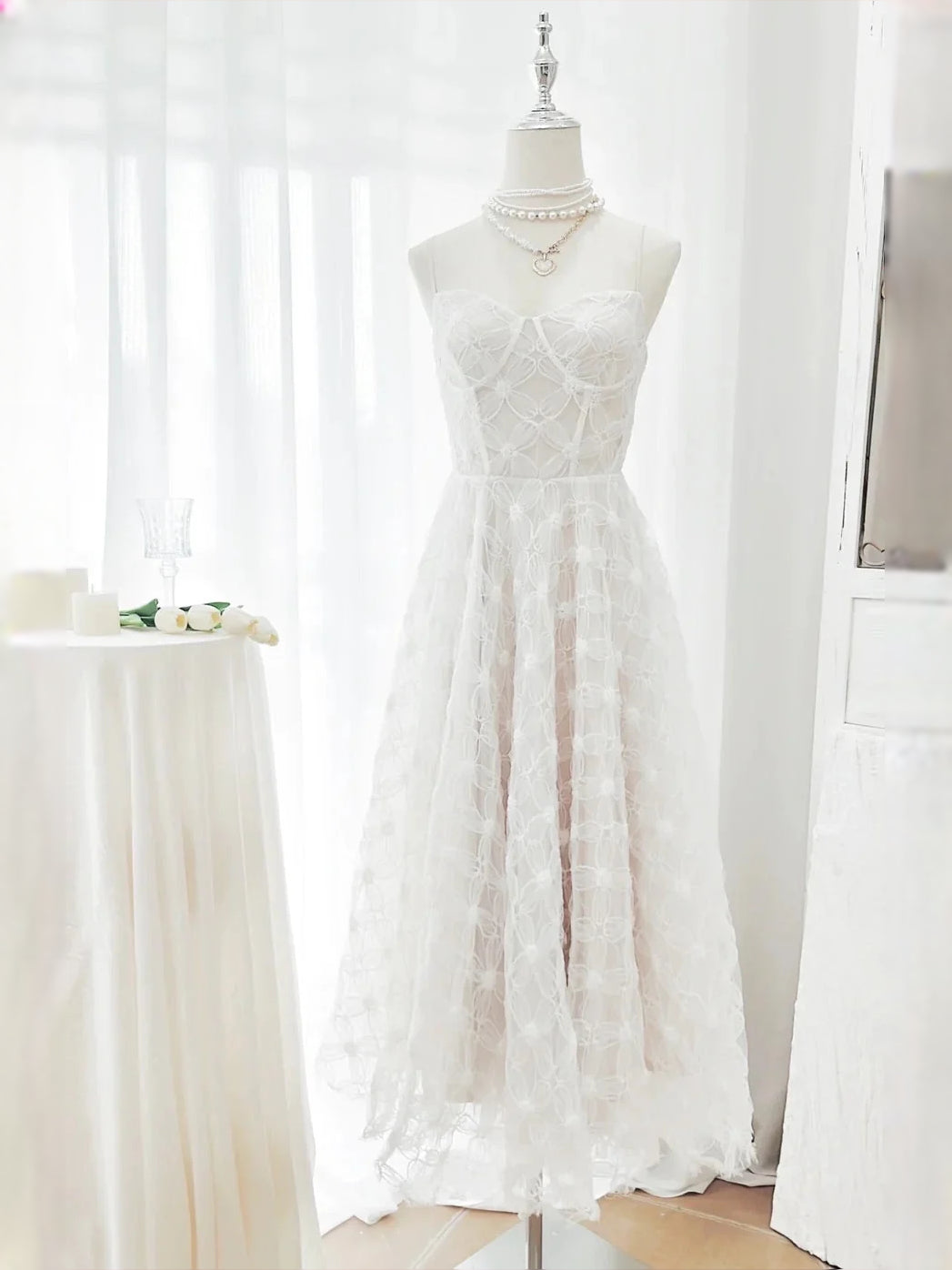Ivory midi wedding dress, alternate view showing the skirt and hem