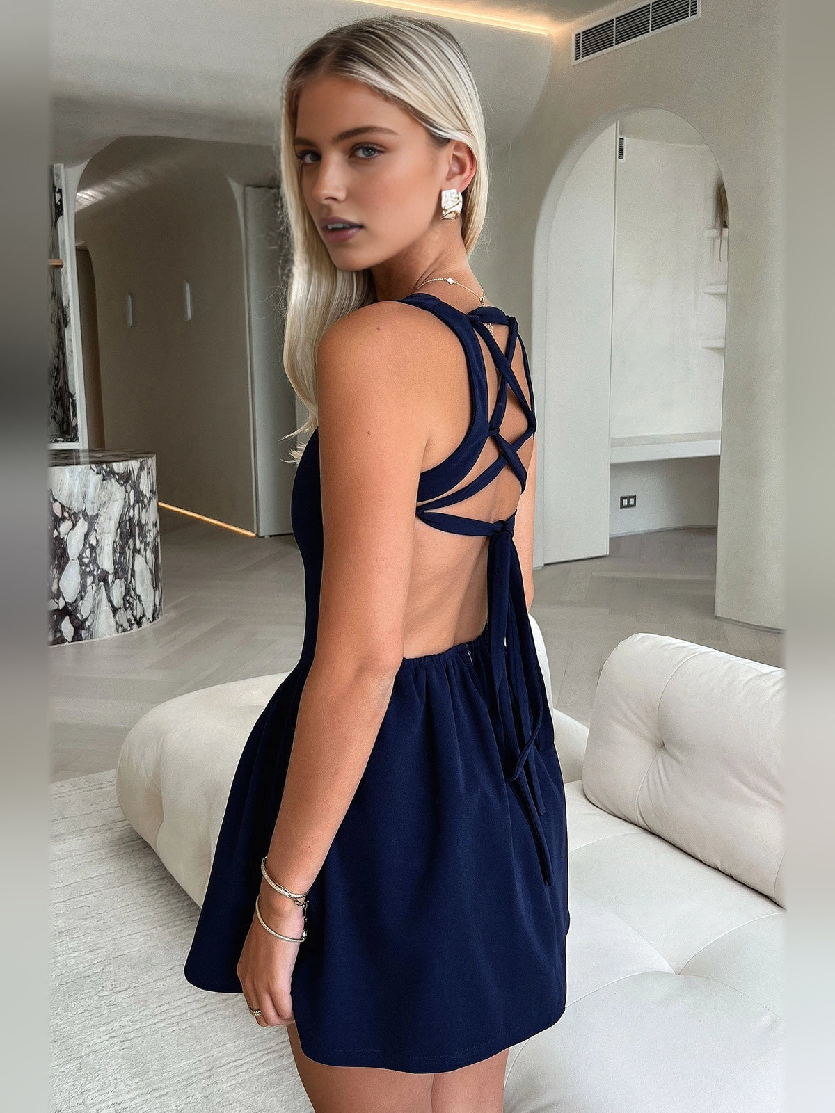 Ivory white mini homecoming dress, alternate view showing the skirt and hem