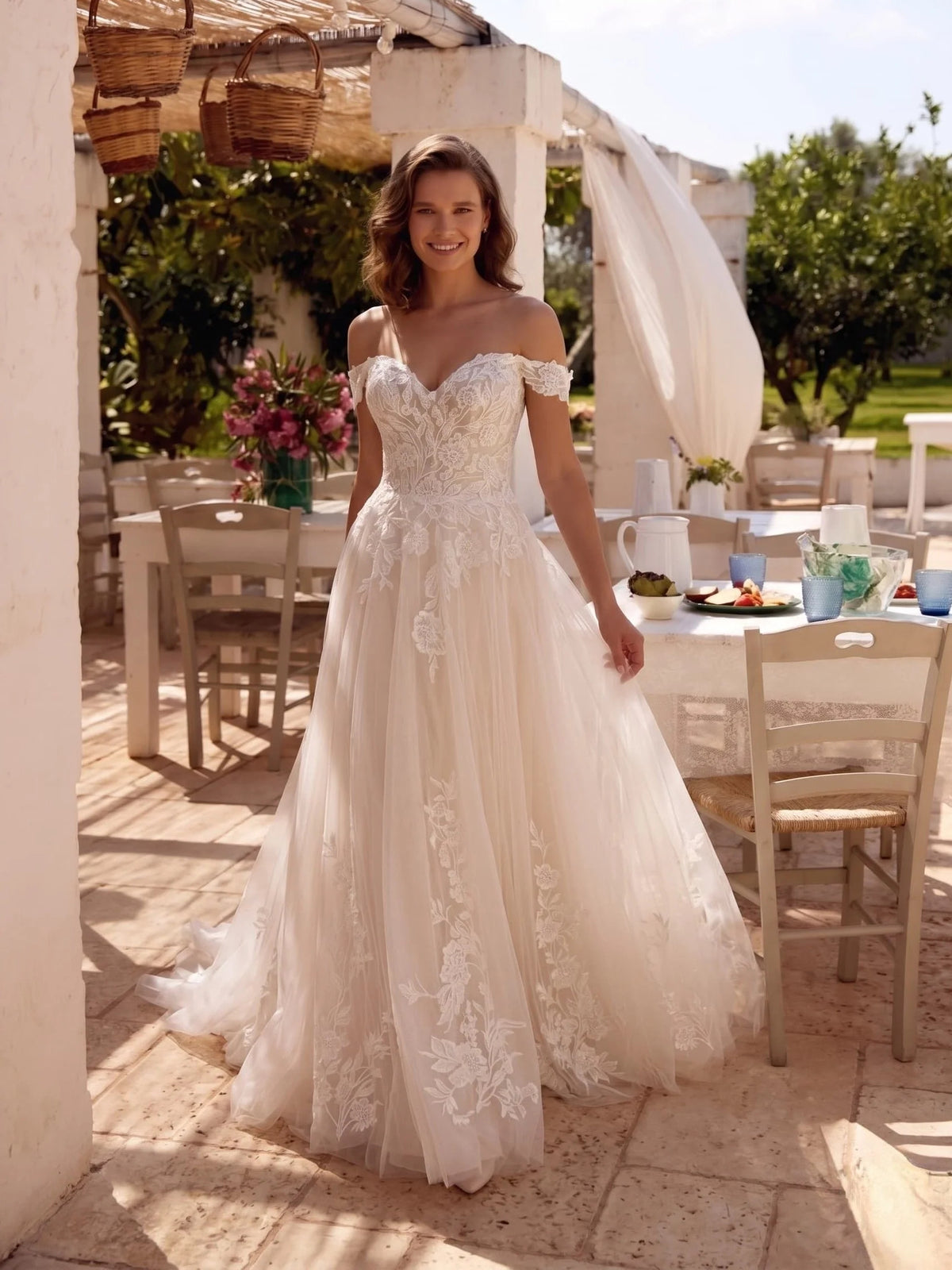 Ivory floor-length wedding dress, alternate view showing the skirt and hem